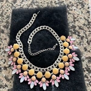Fashion necklace with extender has pink and cream colors